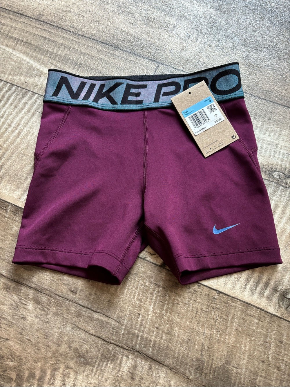 Nike Girls Maroon Athletic Compression Shorts with Teal Accents
